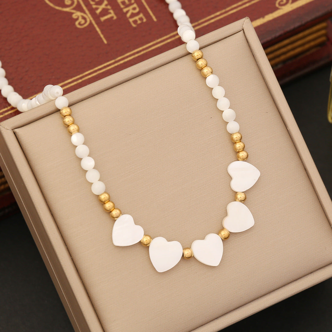 Collares de acero inoxidable de mariposa de la estrella de la concha del mar al por mayor